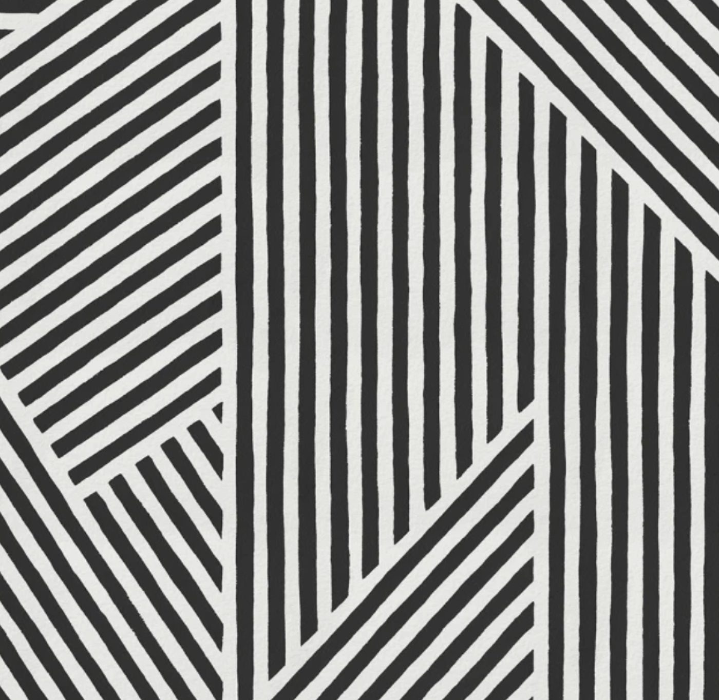 A black-and-white graphic chevron pattern from Down Under's visual identity