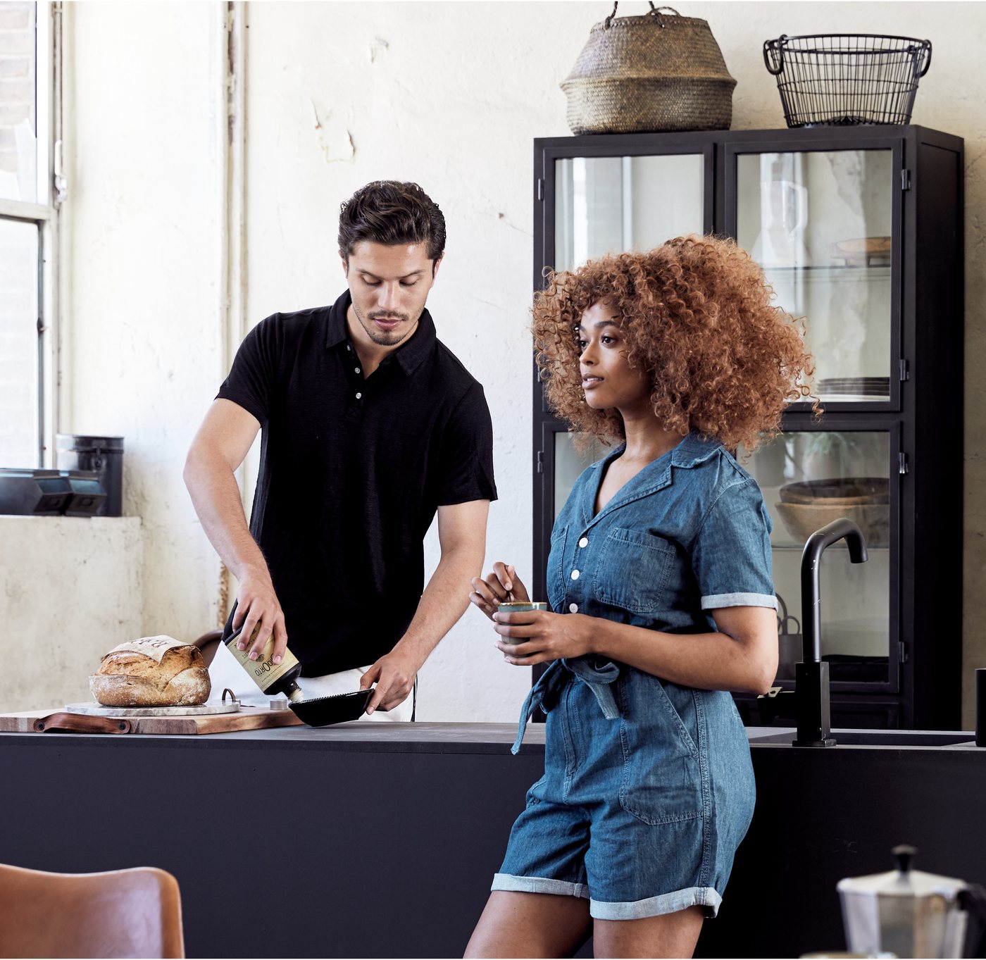 Two models styled in the New Routz kitchen campaign photography